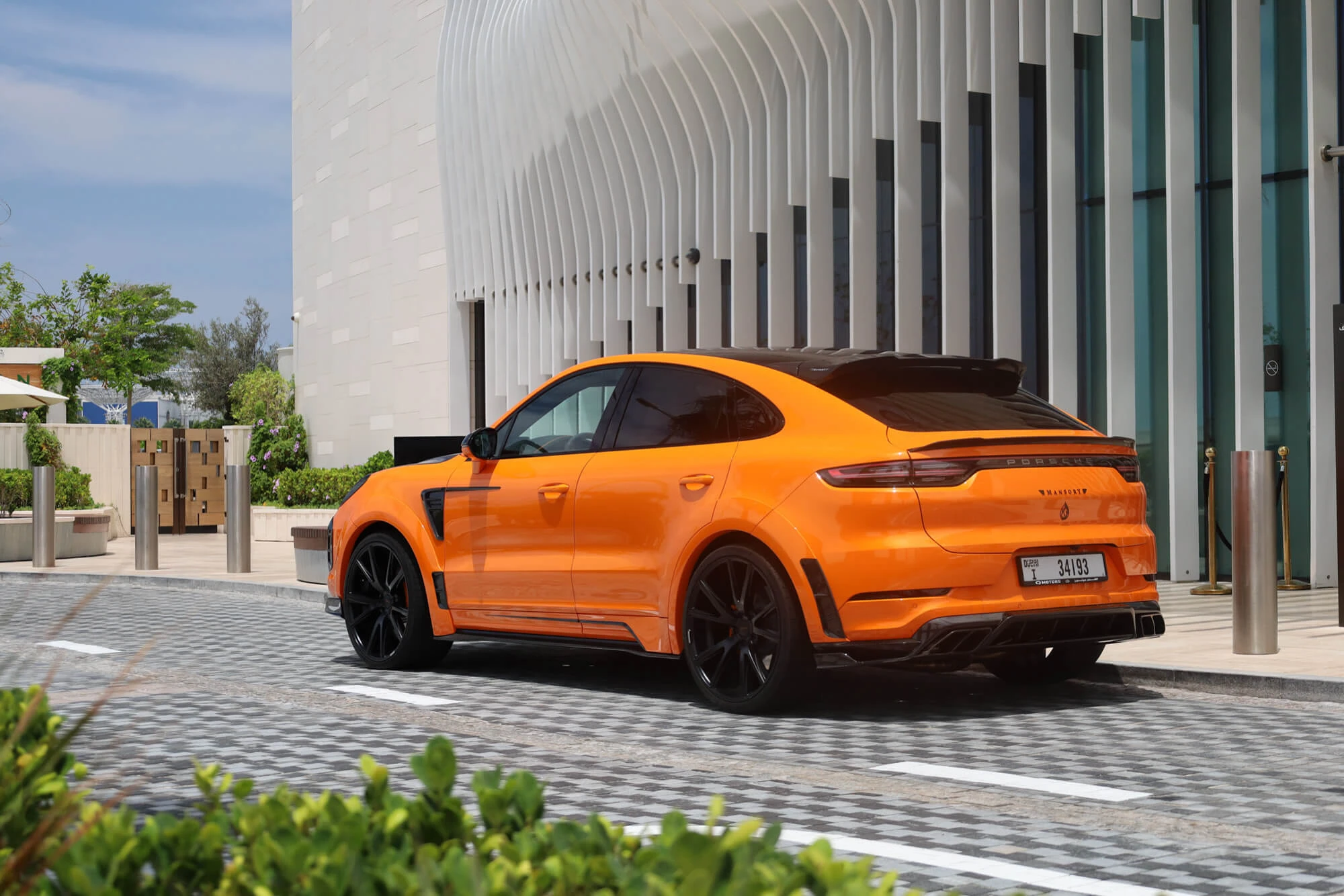 Porsche Cayenne Arancione Mansory