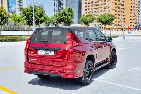 Mitsubishi Pajero Montero Sport 7 Seater Red Octane Luxury Car Rental Dubai