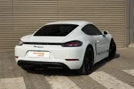 Porsche Cayman белый